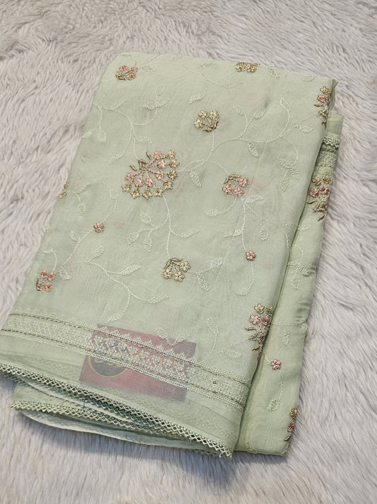 semi organza fancy saree in lime yellow self with allover embroidery work