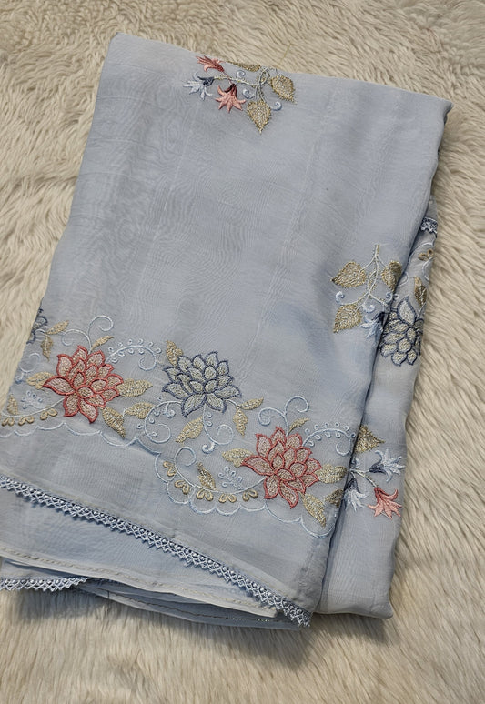 semi organza fancy saree in light blue self with allover embroidery work