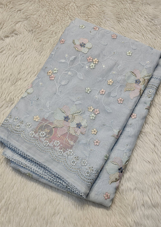 semi organza fancy saree in ice blue self with allover embroidery work
