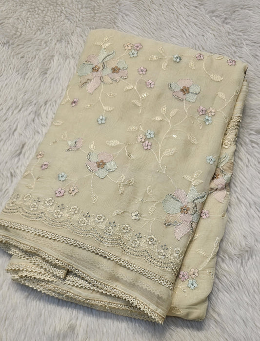 semi organza fancy saree in light bige self with allover embroidery work