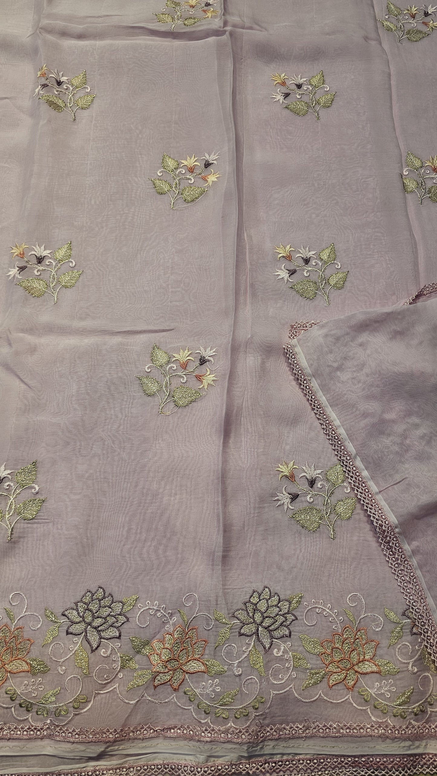 semi organza fancy saree in light lavender with allover embroidery work