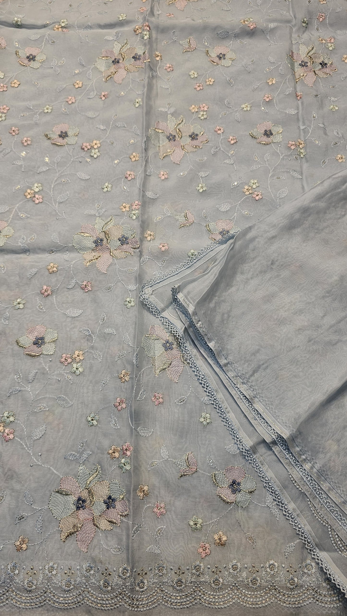 semi organza fancy saree in light bige self with allover embroidery work