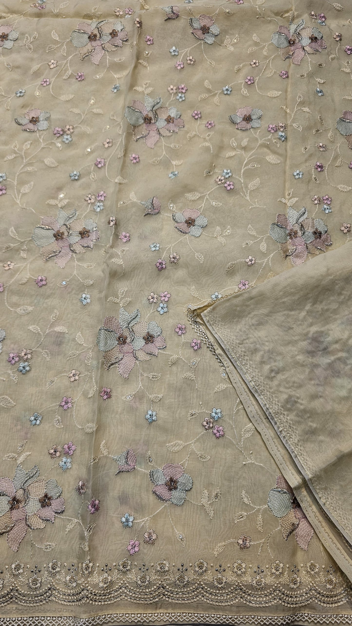 semi organza fancy saree in light yellow self with allover embroidery work