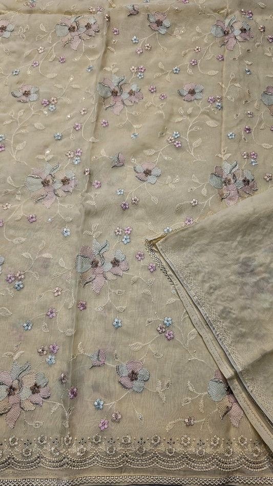 semi organza fancy saree in light yellow self with allover embroidery work