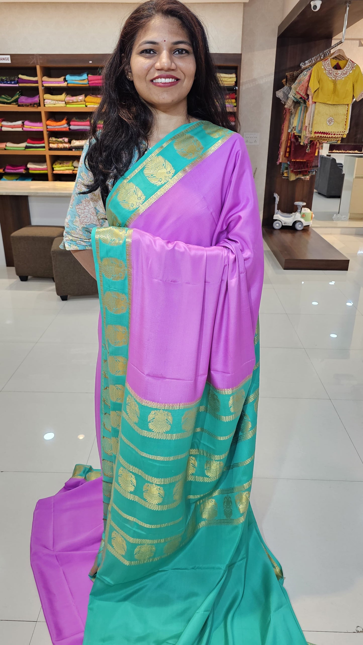 mysore crepe silk sarees in KSIC Finish in onion pink with teal ganda berunda border