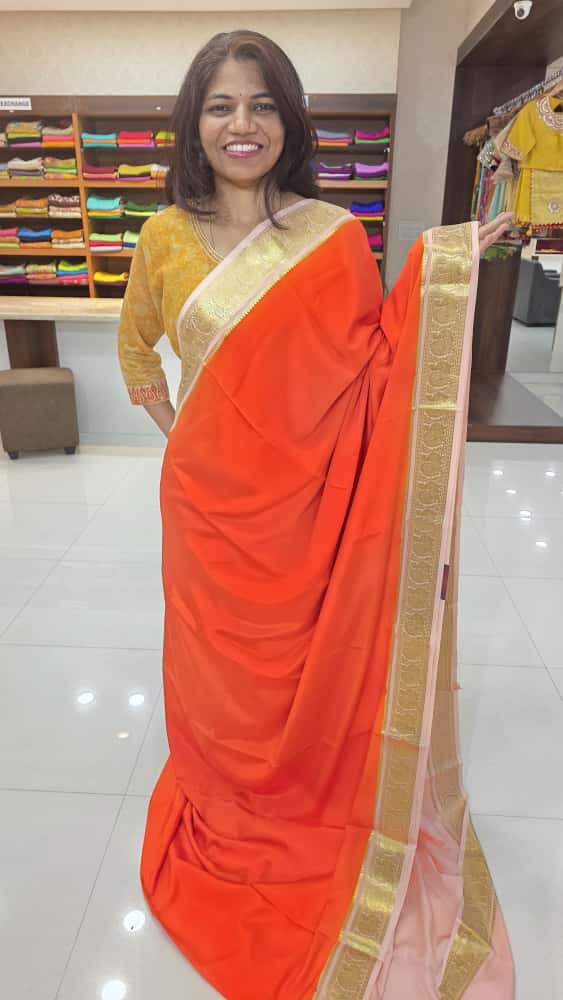 Mysore crepe silk saress in KSIC Finish in orange with peach with peacock border
