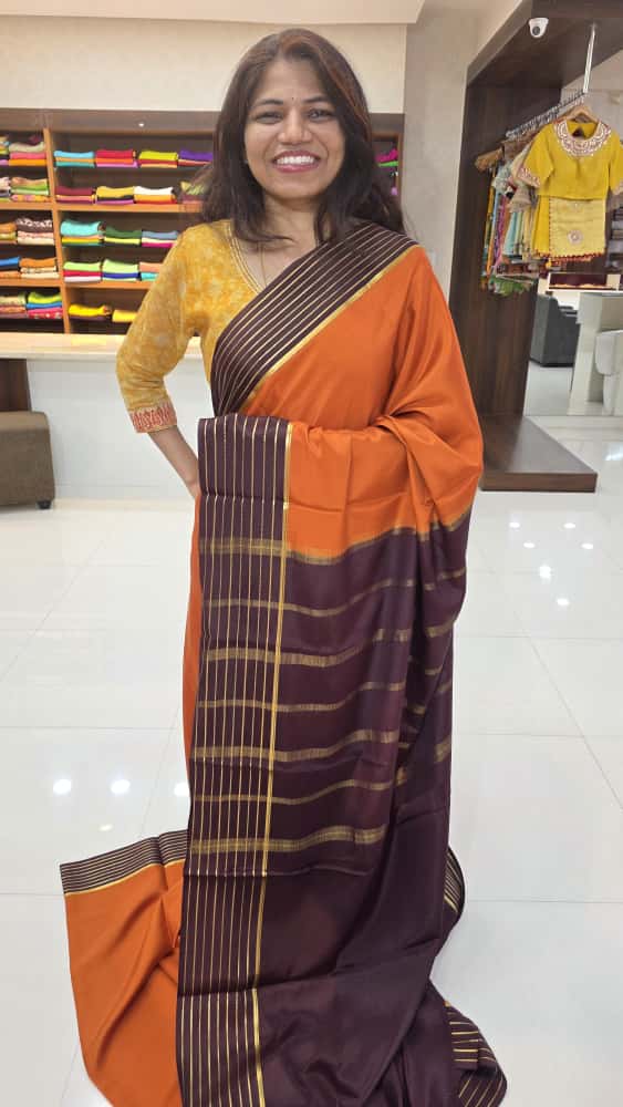 Mysore crepe silk sarees in KSIC Finish in rust orange with brown lines border