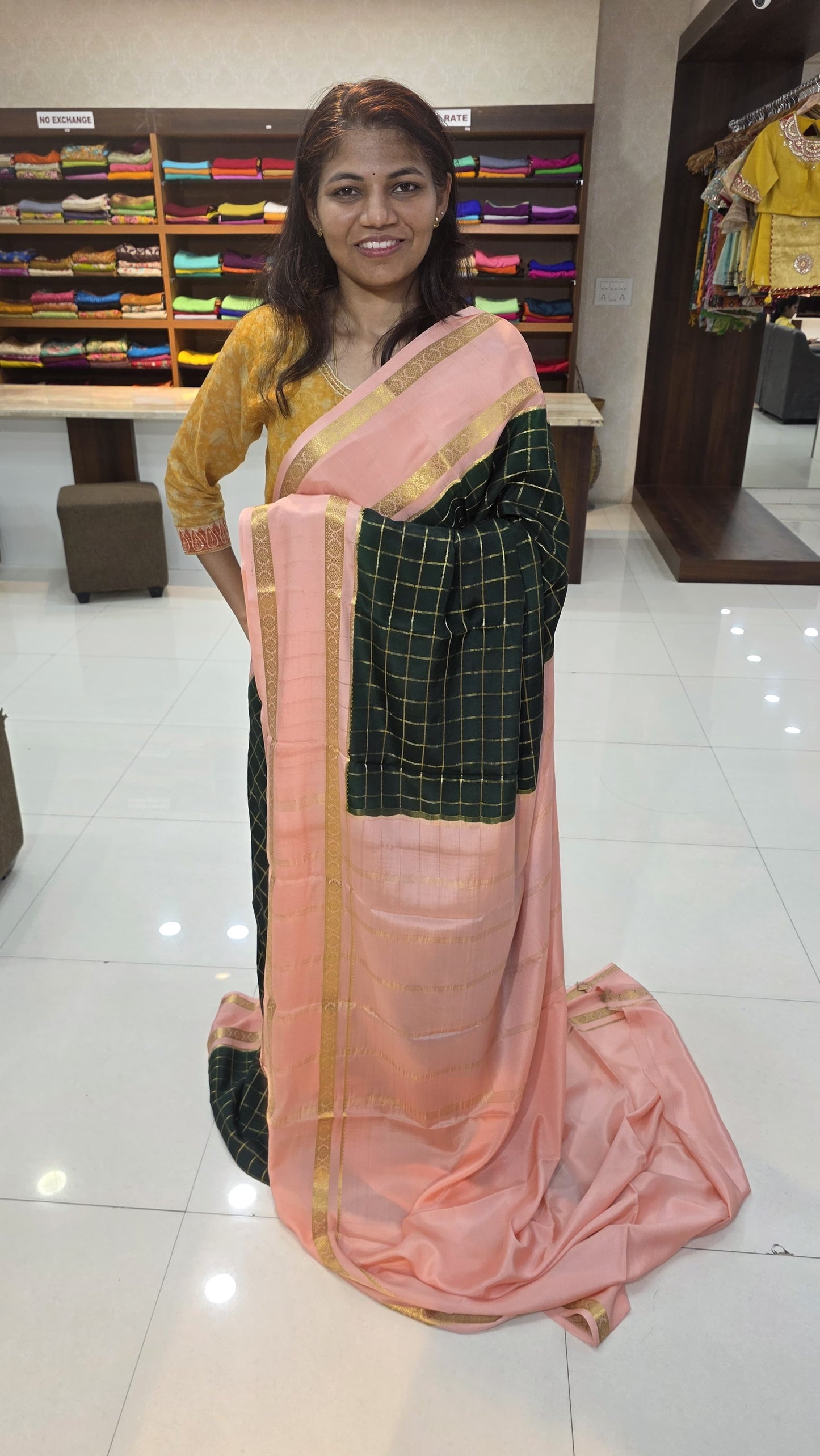 Mysore crepe silk saree with KSIC Finish in bottle green with peach checks pattern