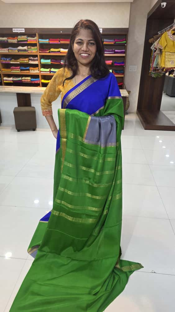 Mysore crepe silk saree with KSIC Finish in bottle green with grey half and half pattern