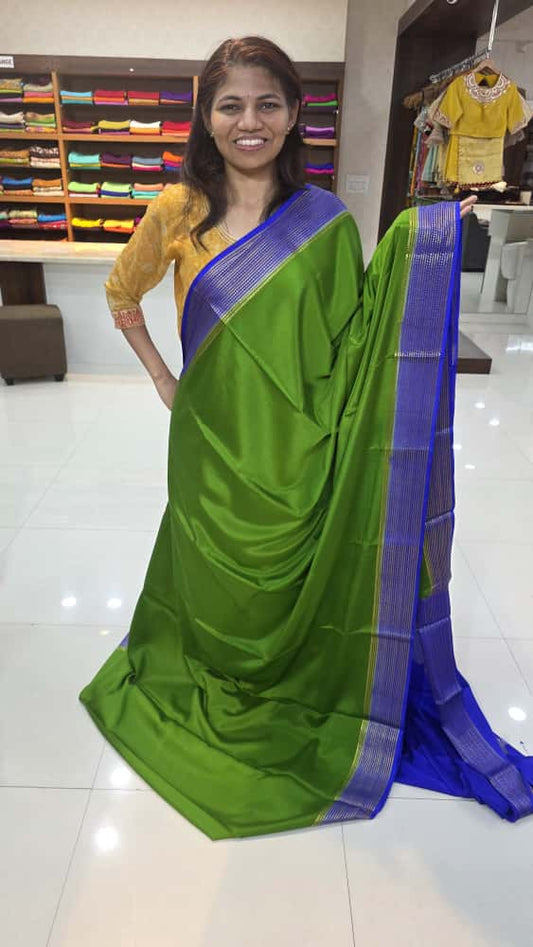 Mysore crepe silk saree with KSIC Finish in leaf green with royal blue big border