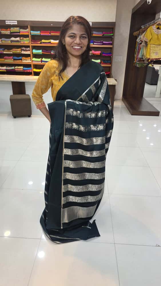 Mysore crepe silk saree with KSIC Finish dark bottle green neetha ambani saree
