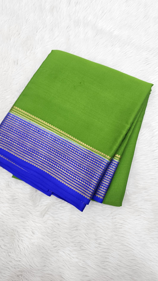 Mysore crepe silk saree with KSIC Finish in leaf green with royal blue big border
