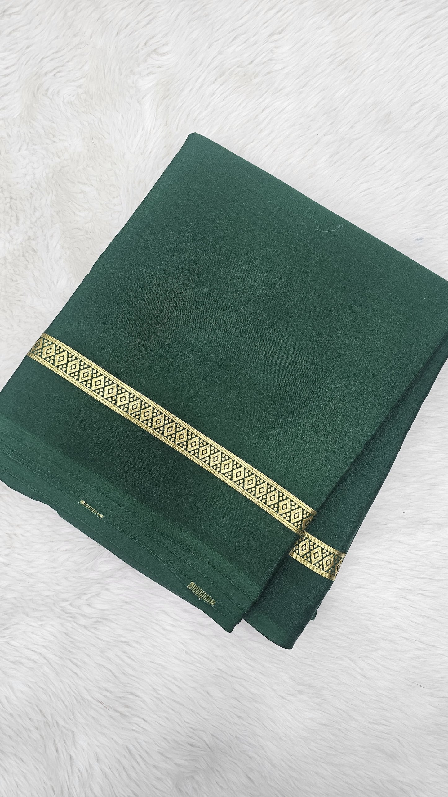 Mysore crepe silk saree with KSIC Finish in bottle green single tone gap border