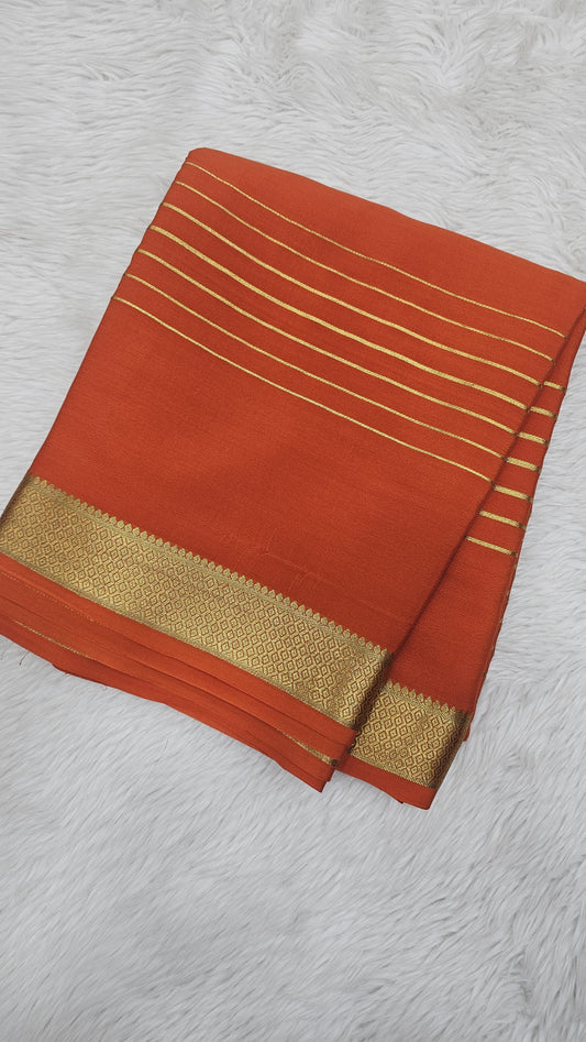 Mysore crepe silk sarees in KSIC Finish in orange self color lines pattern