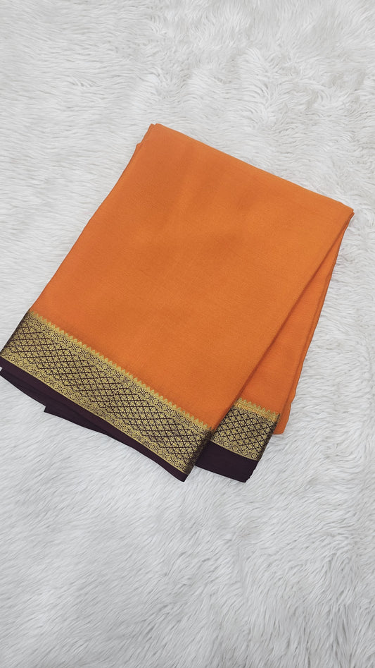 Mysore crepe silk in KSIC Finish in rust orange with brown small border