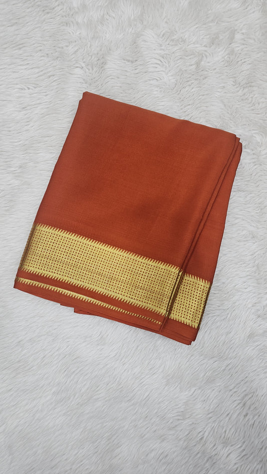 Mysore crepe silk saree in KSIC Finish in rust orange single tone saree