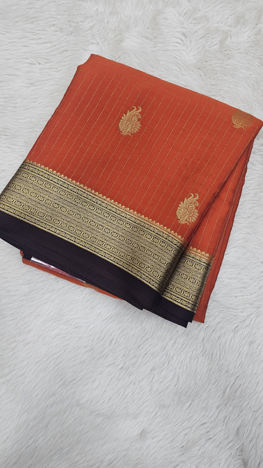 Mysore crepe silk saree in KSIC Finish in rust orange dark snuff brown all over butta saree