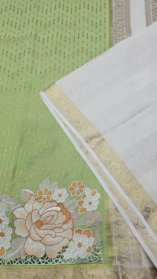 Mysore crepe silk saree in KSIC Finish in pista green with crem 1side cutwork saree