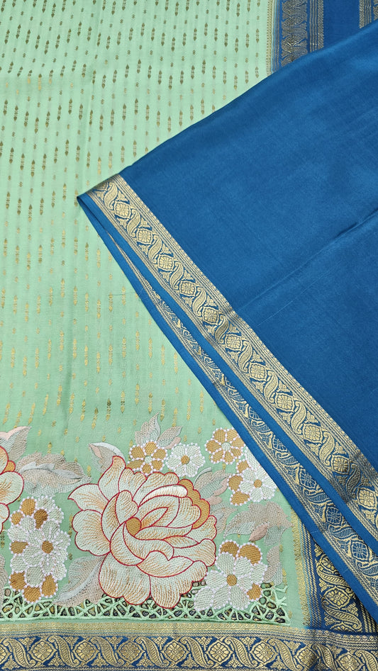 Mysore crepe silk saree in KSIC Finish in pista green with rama blue 1 sides cutwork