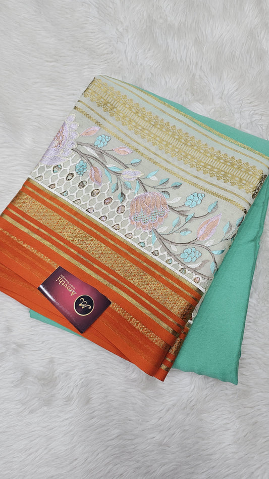 Mysore crepe silk saree in KSIC Finish in rama green with orange 2side cutwork saree