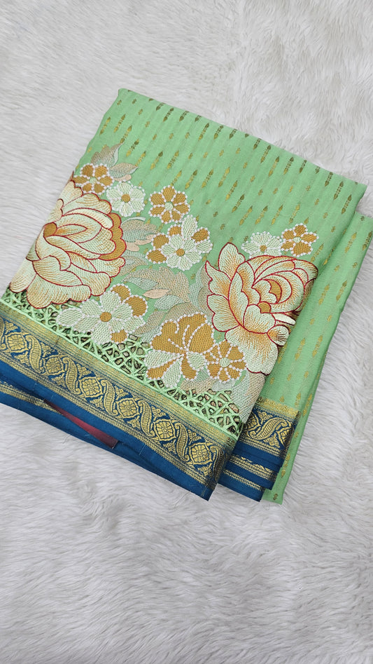 Mysore crepe silk saree in KSIC Finish in pista green with rama blue 1 sides cutwork