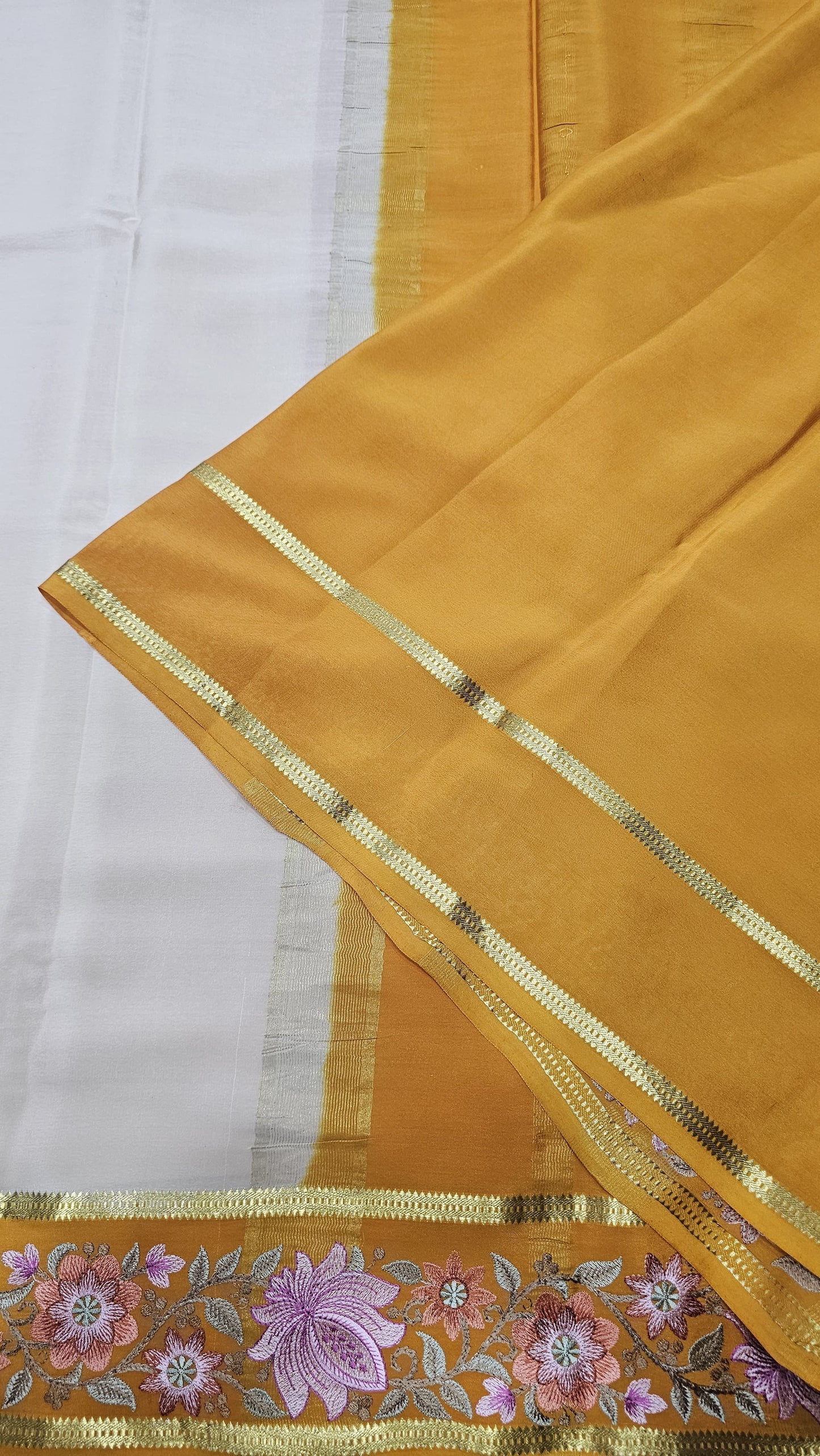 Mysore crepe silk saree in KSIC Finish in cream with methi 2side embroidery