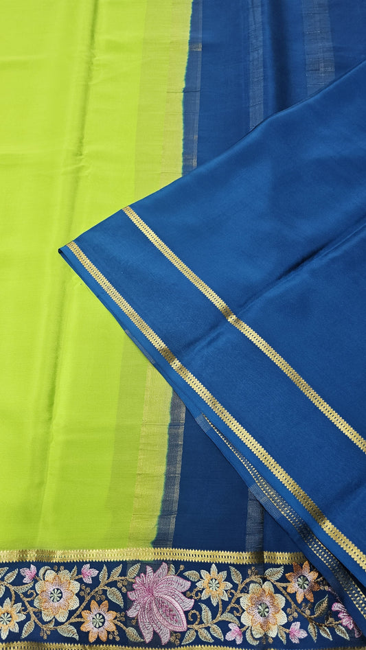 Mysore crepe silk saree in KSIC Finish in paroot green with peacock blue 2side embroidery