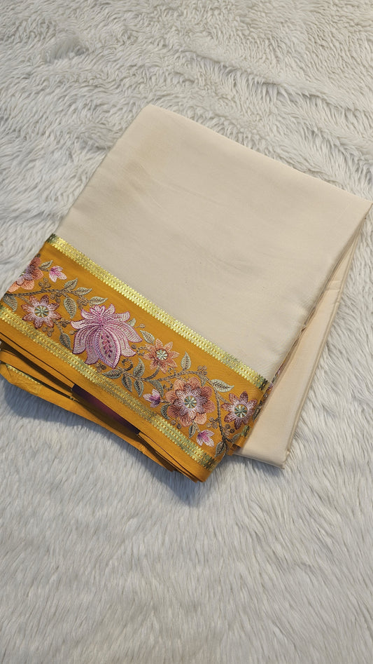 Mysore crepe silk saree in KSIC Finish in cream with methi 2side embroidery