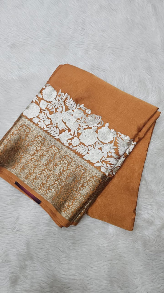 Mysore crepe silk saree in KSIC Finish in dark beige self embroidery pattern