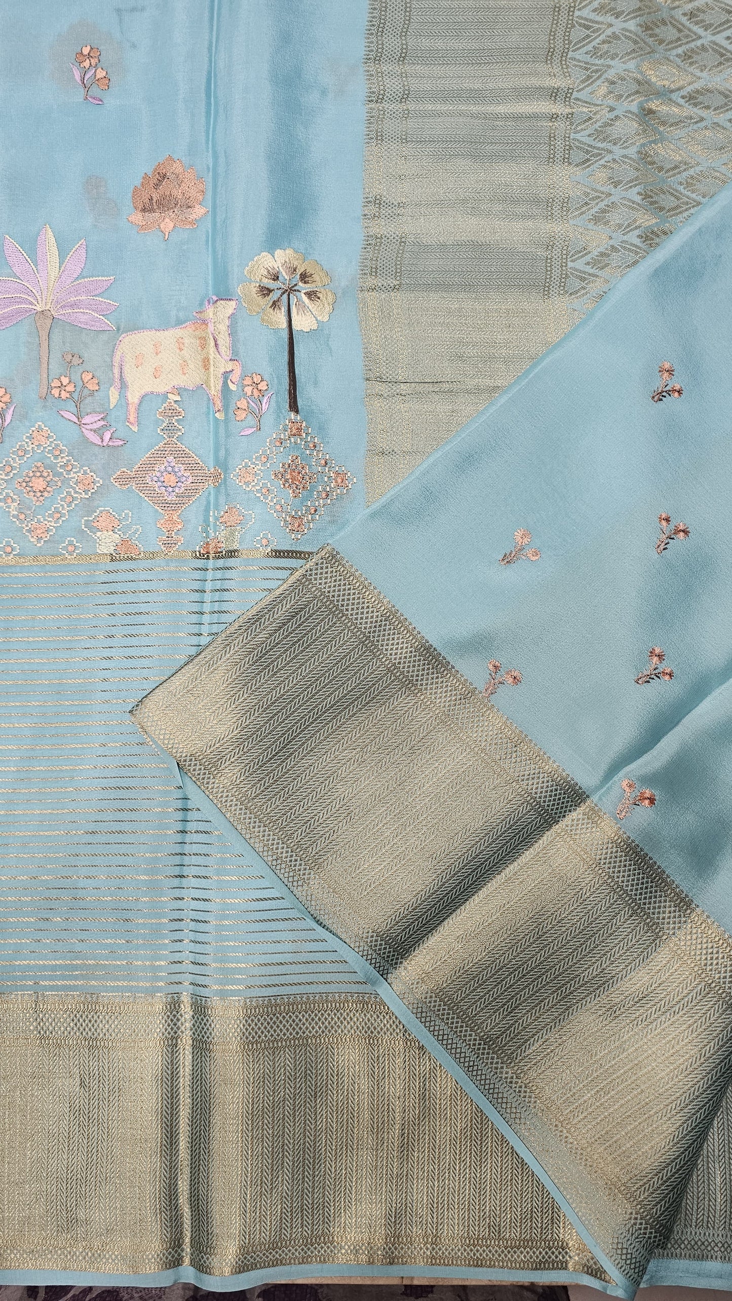 Mysore crepe silk saree in KSIC Finish in ice blue self middle pichwai pattern