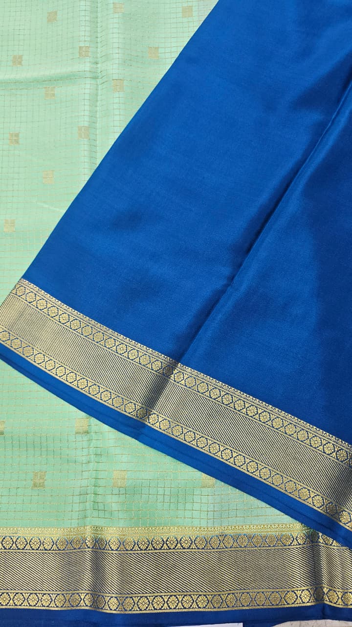 Mysore crepe silk saree in KSIC Finish in pista green with rama blue checks with bentex border