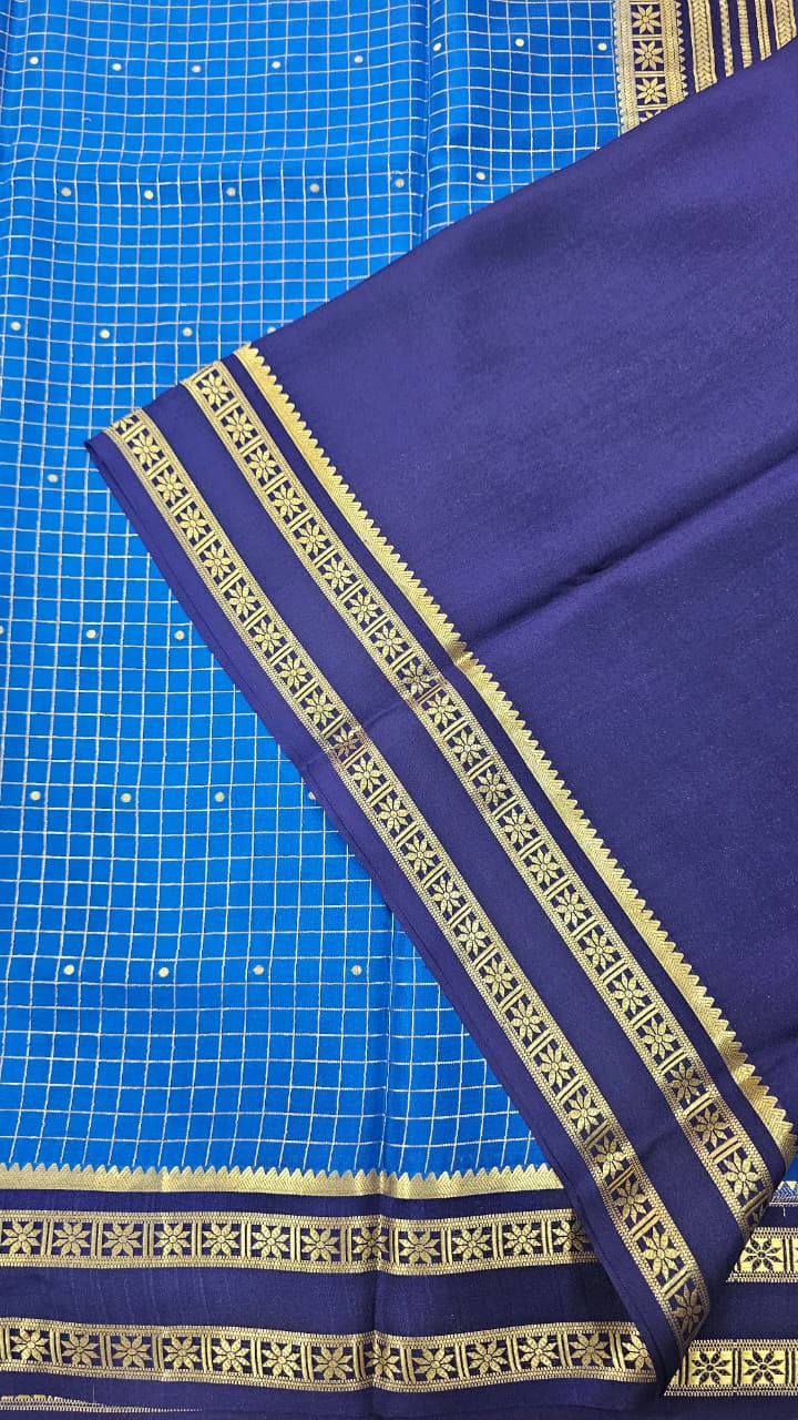 Mysore crepe silk saree in KSIC Finish in peacock blue with ink blue checks with bentex border
