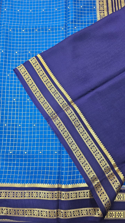 Mysore crepe silk saree in KSIC Finish in peacock blue with ink blue checks with bentex border