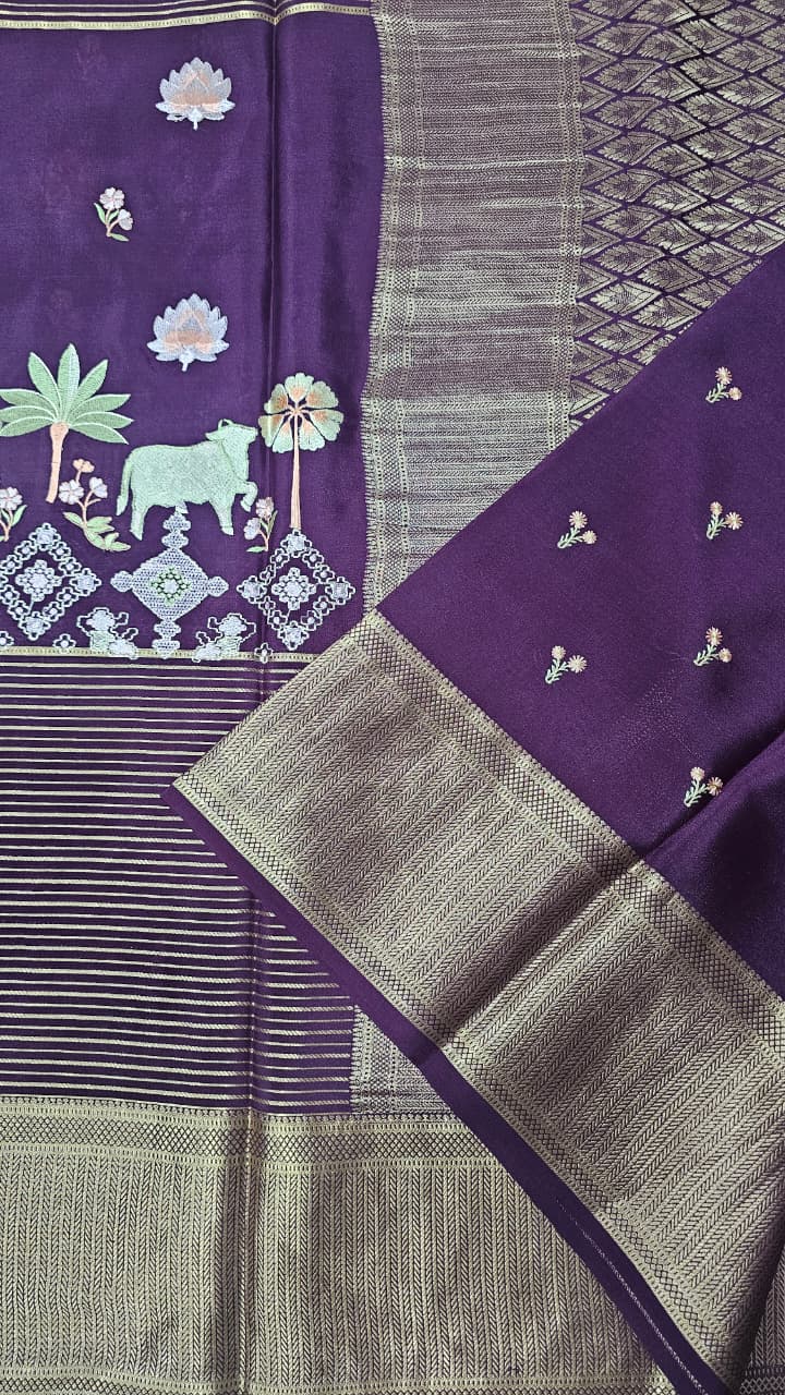 Mysore crepe silk saree in KSIC Finish in wine self middle pichwai embroidery pattern