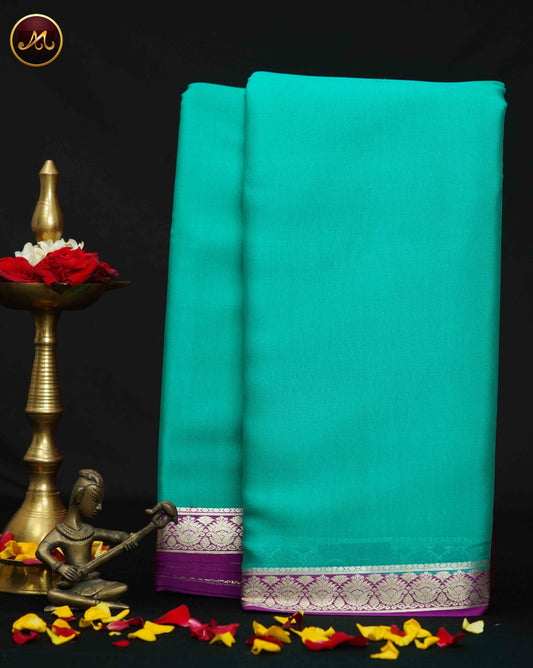 Mysore Crepe Silk saree with KSIC finish in Teal and Wine combination with Silver Zari Border and Chit  Pallu