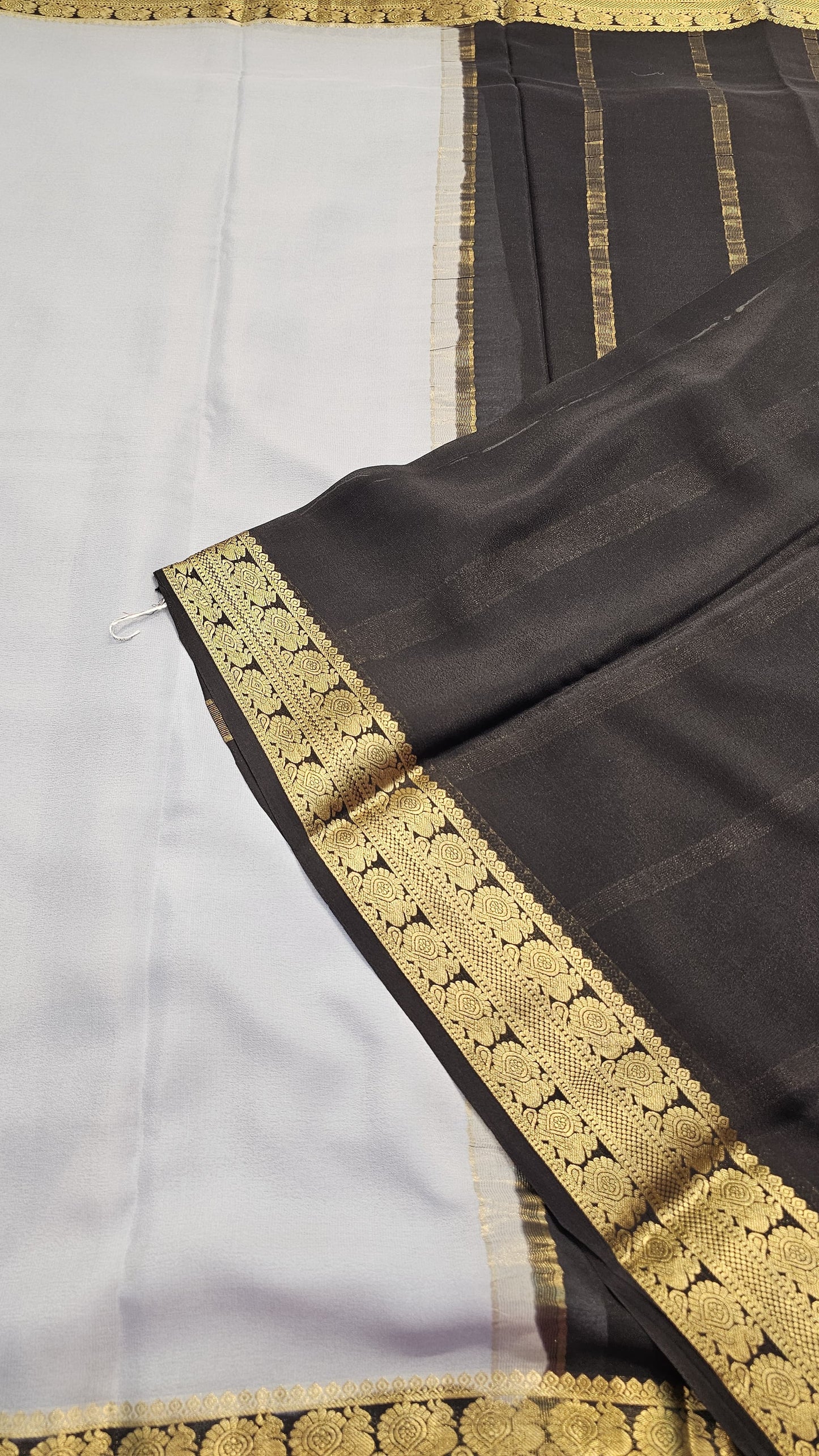 Mysore crepe silk saree with KSIC Finish in mist grey with black in peacock border