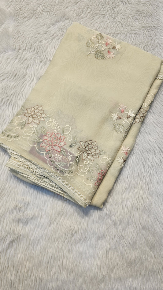 Semi organza fancy saree in light cream self with allover embroidery work