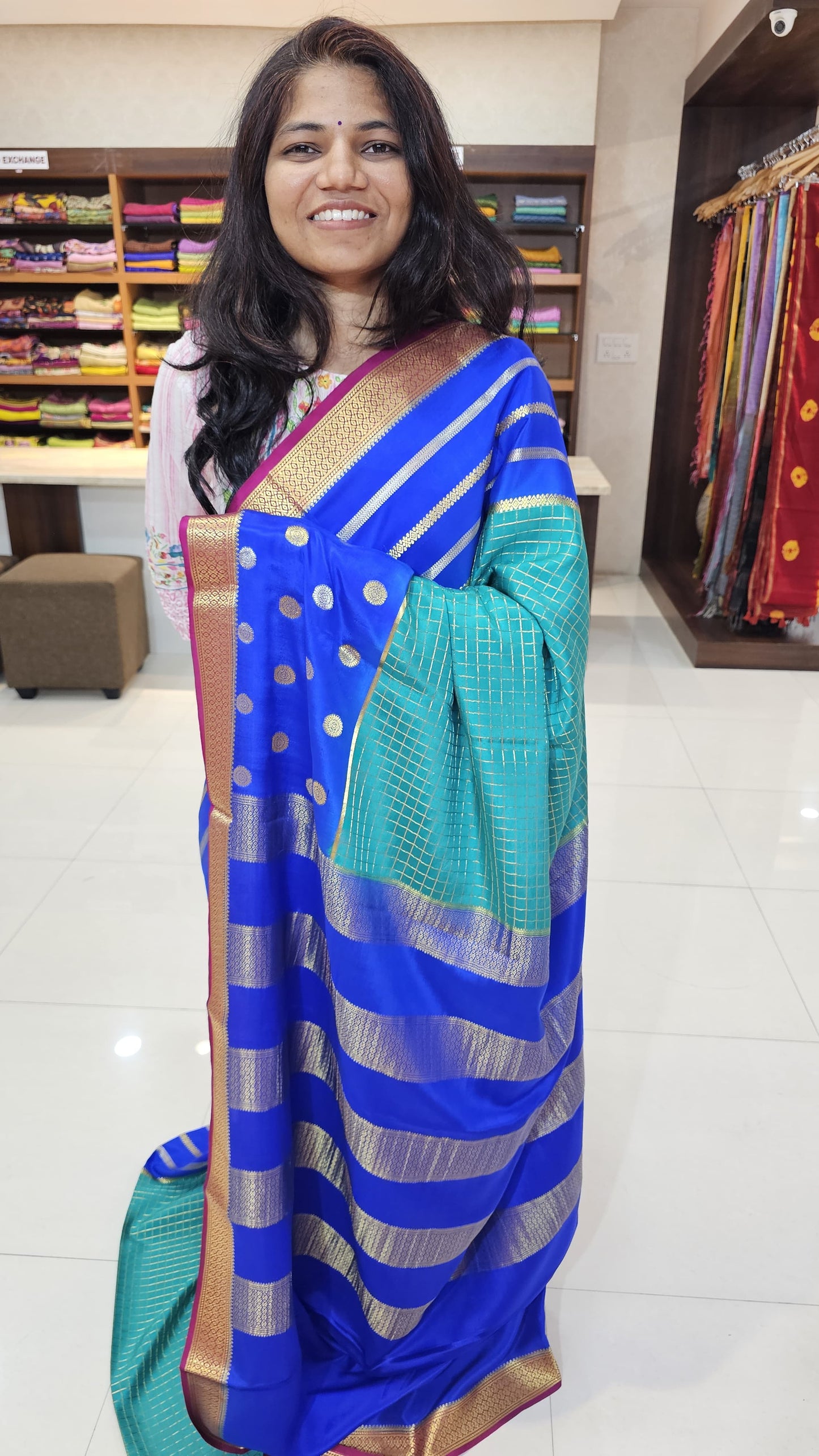 Mysore crepe silk saree with KSIC Finish in turquoise blue with royal bluein 3D checks pattern