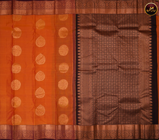 Kanchivaram Handloom Pure -Silk in Butta Pattern in Orange  And Brown combination with Copper Zari  Border
