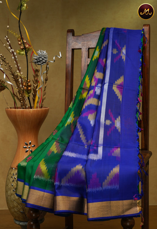 Handloom Soft silk Saree in Bottle Green and Navy Blue colour combination with gold and meena butta allover the body and Ikat Pallu and Gatti Zari Border