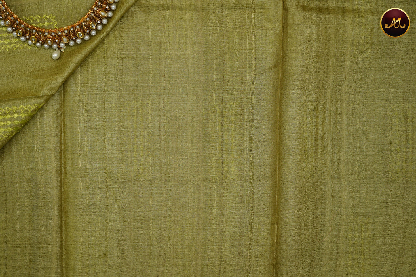 Pure tussar silk saree in all self olive green combination with silk thread work butta