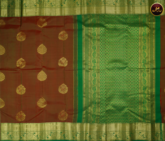 Kanchivaram Handloom Pure -Silk in Butta Pattern in Anjeer Green  And Teal combination with Gold Zari  Border