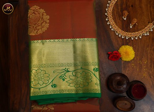 Kanchivaram Handloom Pure -Silk in Butta Pattern in Anjeer Green  And Teal combination with Gold Zari  Border
