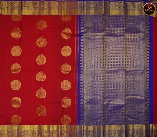 Kanchivaram Handloom Pure -Silk in Butta Pattern in Red  And Purple combination with Gold Zari  Border