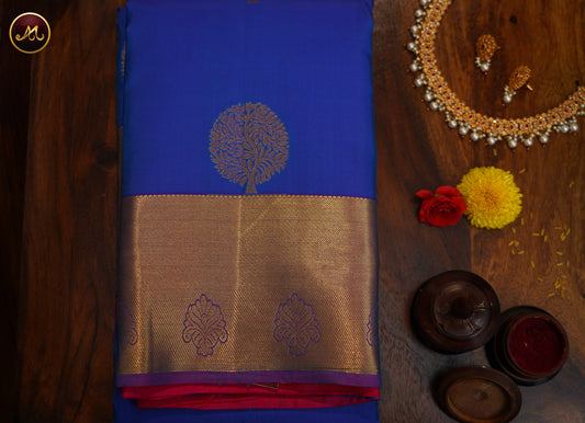 Kanchivaram Handloom Pure -Silk in Butta Pattern in Ink Blue  And Rani Pink combination with Gold Zari  Border