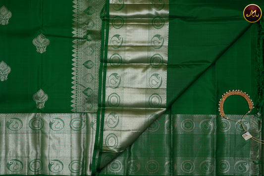 Kanchivaram Handloom Pure Silk in Butta Pattern in All Self Leaf green with Silver Zari long Border and Rich Pallu