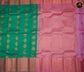 Kanchipuram Semi-Silk Sarees in Rama Green and Ponds Pink Combination with emboss work allover the body and copper zari border and Rich Pallu