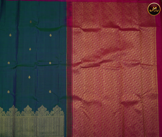 Kanchivaram Handloom Pure Silk in Butta Pattern in Peacock Blue  And Rani Pink combination with Gold Zari Turning Border and Rich Pallu