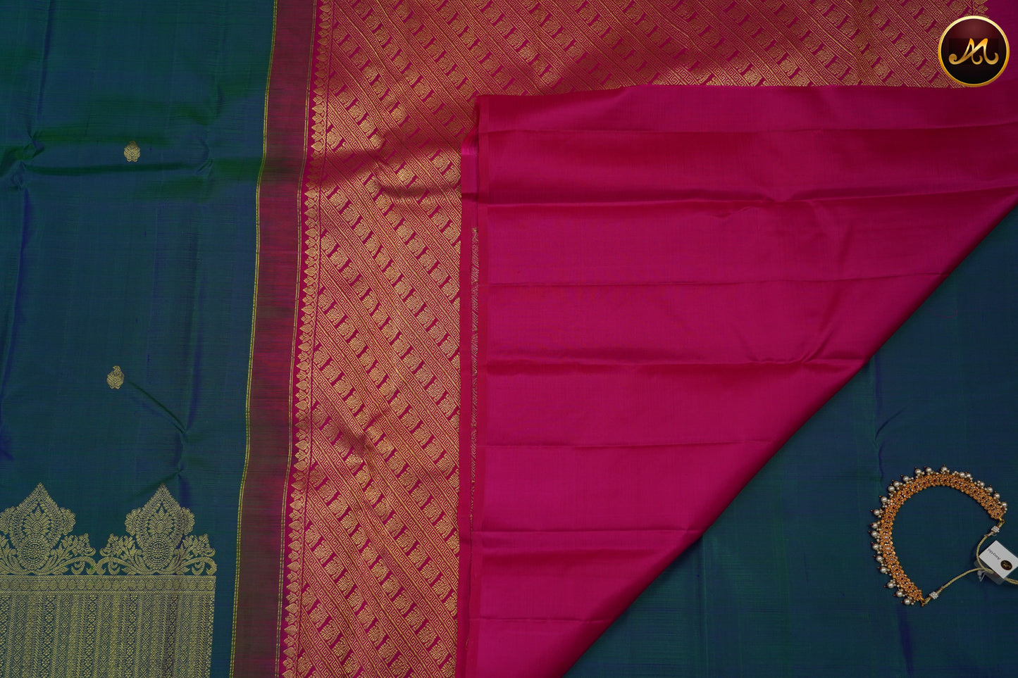 Kanchivaram Handloom Pure Silk in Butta Pattern in Peacock Blue  And Rani Pink combination with Gold Zari Turning Border and Rich Pallu