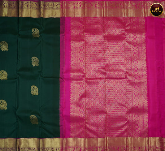 Kanchivaram Handloom Pure Silk in Butta Pattern in Bottle green  And rani Pink combination with Gold Zari  Border and Rich Pallu